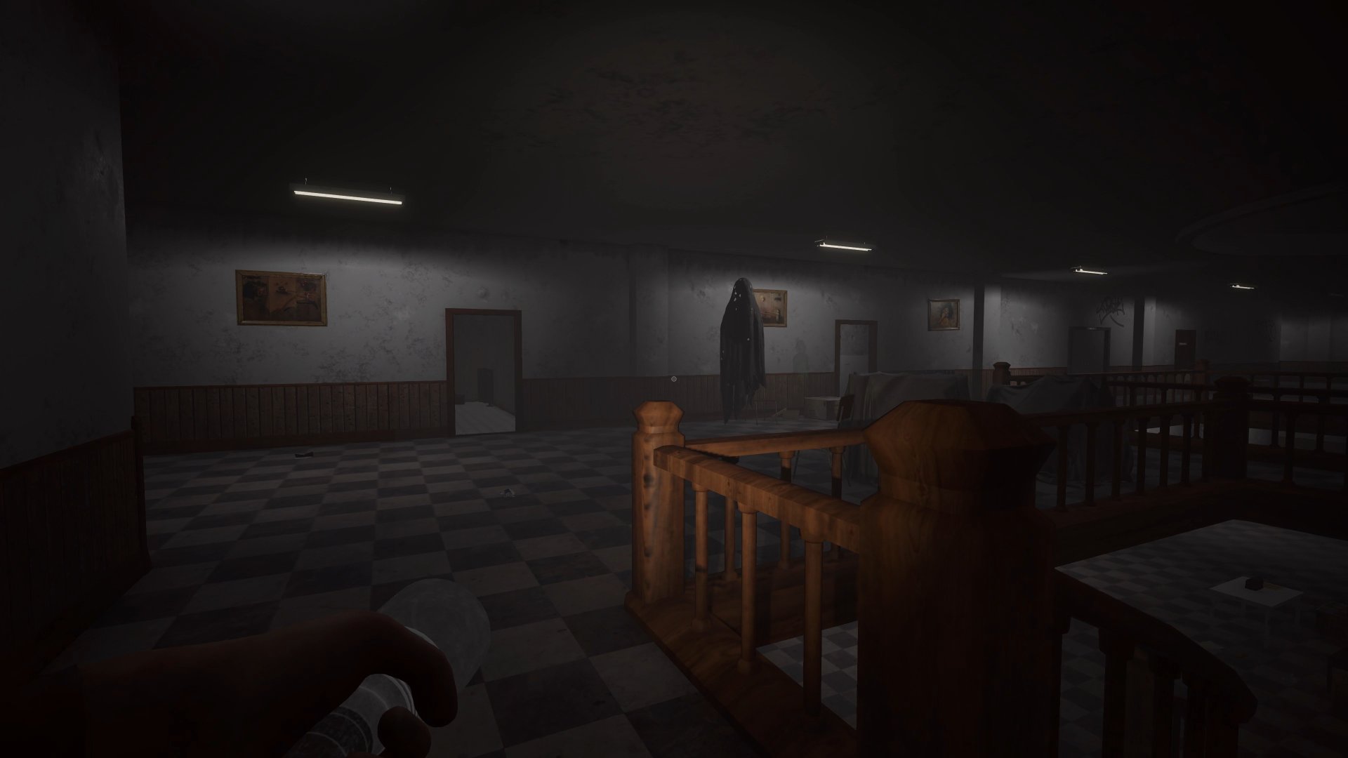 Dark corridor and stairwell with checkered floor
